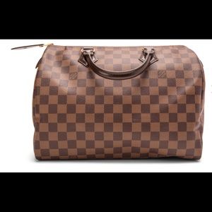 Louis Vuitton “ Speedy” Bag